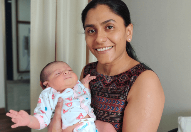 Dr Harsha V Reddy Holding a Baby